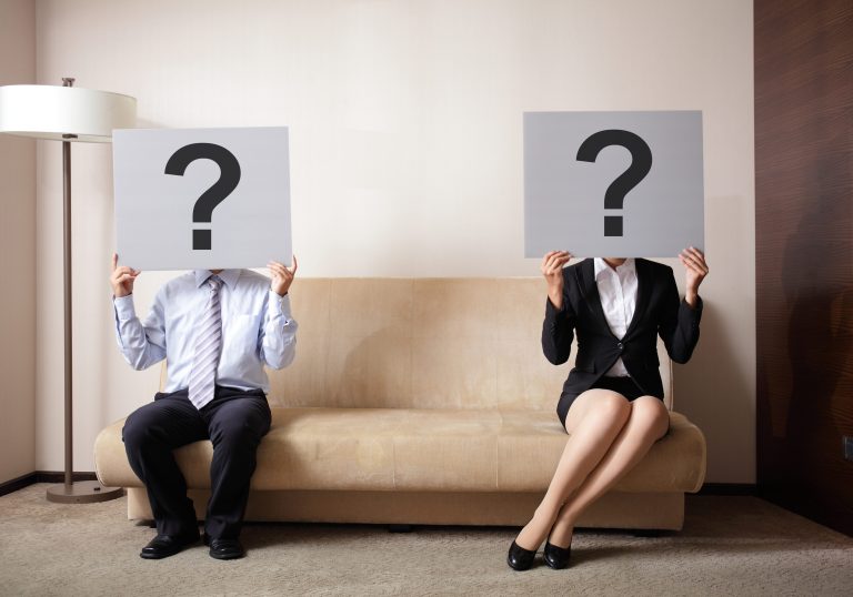 Problem,In,Young,Couple,-,Young,Couple,Holding,Billboard,Sign